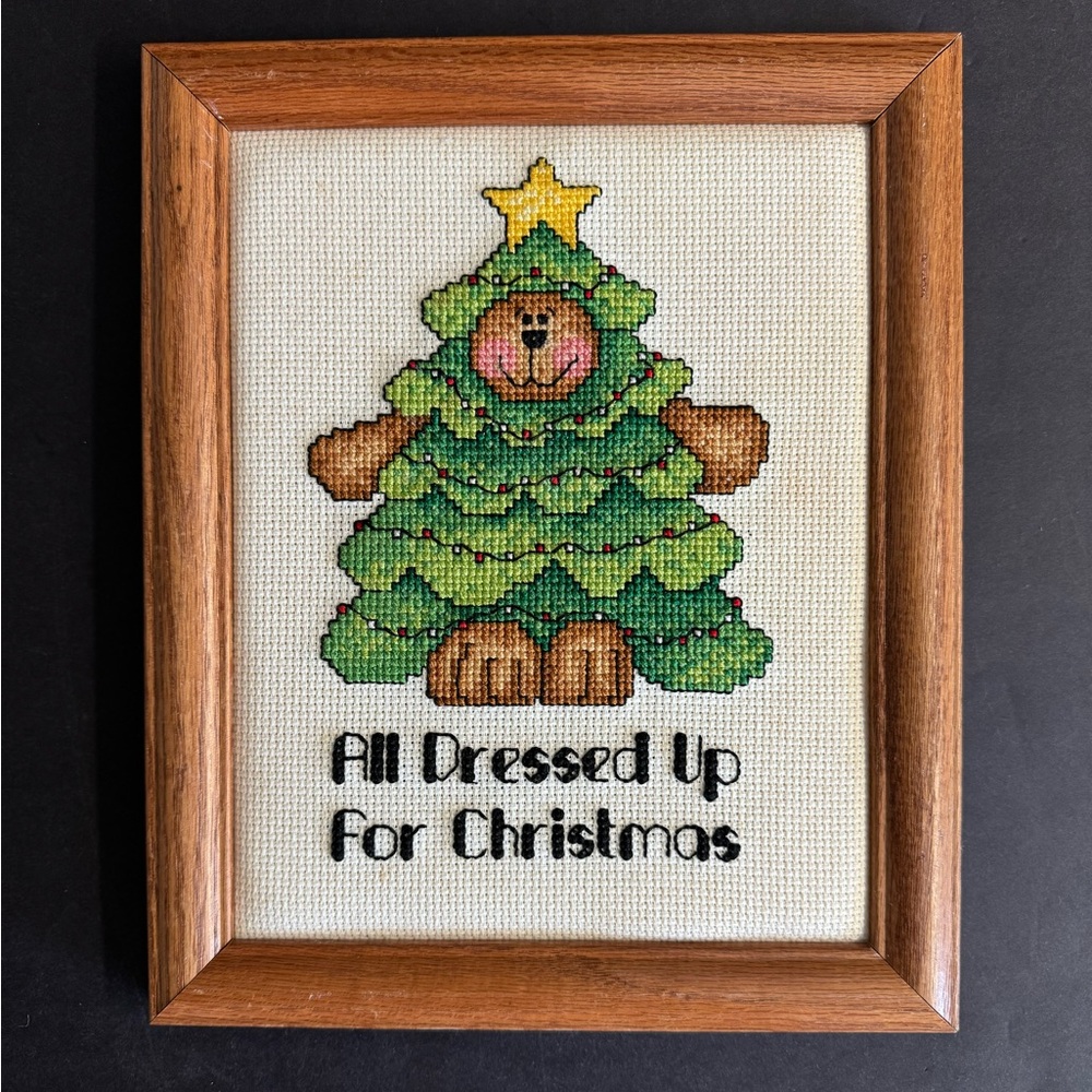 Vintage handmade needlepoint green and white Christmas decor.Wood frame.